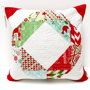 Weihnachtliche Kissenhülle - Half Square Triangles / Jingle